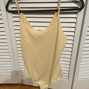 Yellow bodysuit